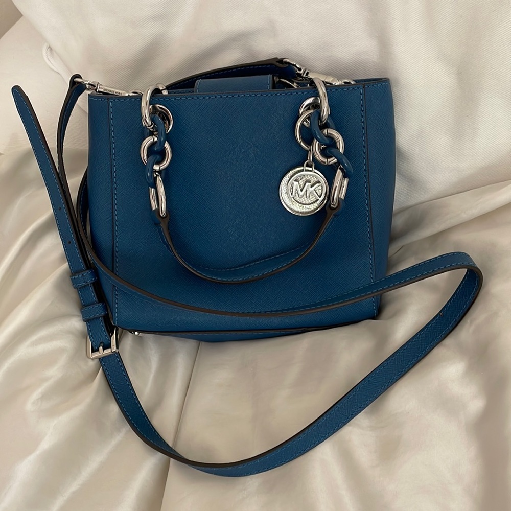 Small bright blue Michael Kors purse